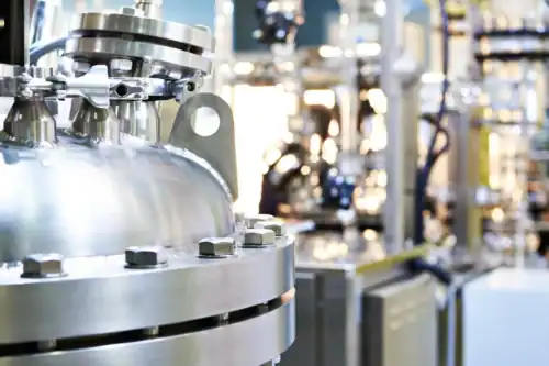 Close on stainless steel reactor in biotechnology manufacturing facility